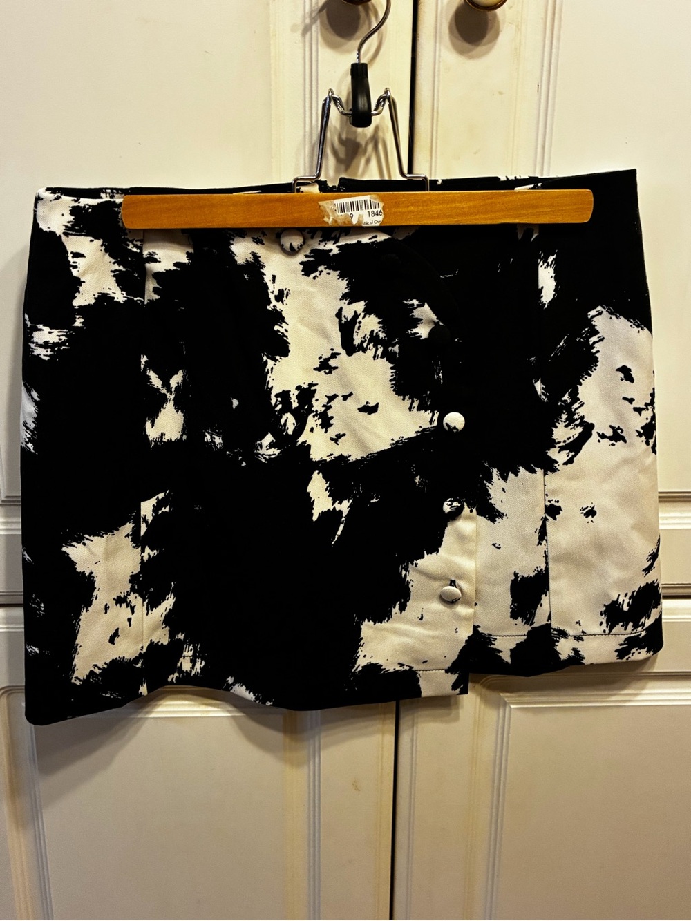 Urban Outfitters mini skirt features a bold black & white cow print pattern